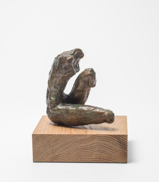 Figurative sculpture Held with Green Patina