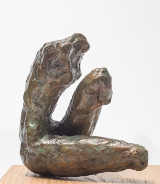 Figurative sculpture Held with Green Patina