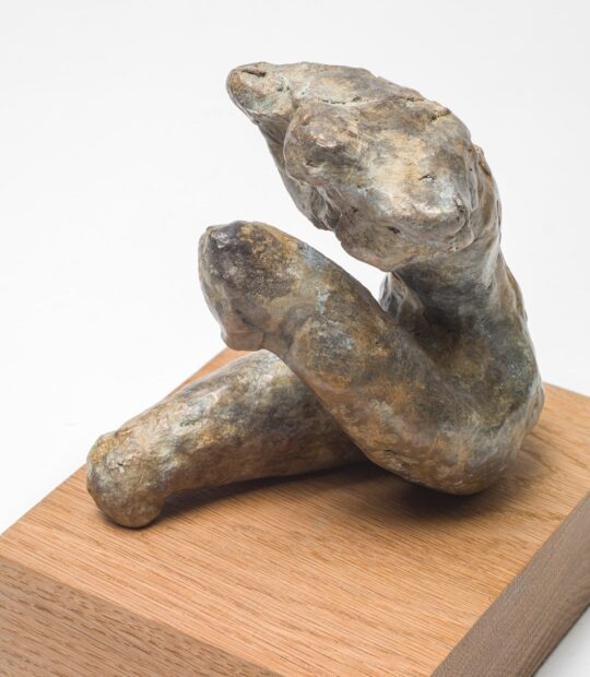 Figurative sculpture Held with Light Patina