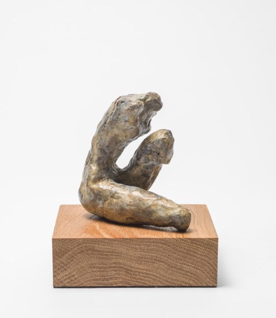 Figurative sculpture Held with Light Patina