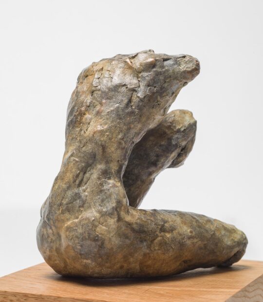 Figurative sculpture Held with Light Patina