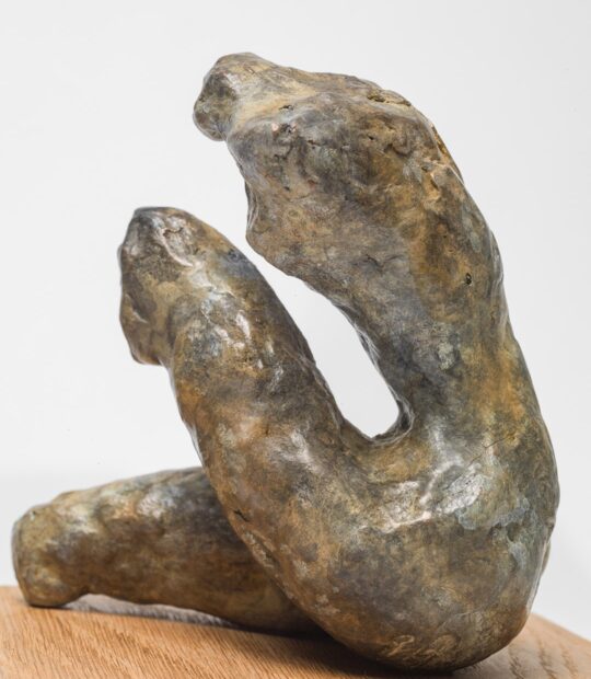 Figurative sculpture Held with Light Patina