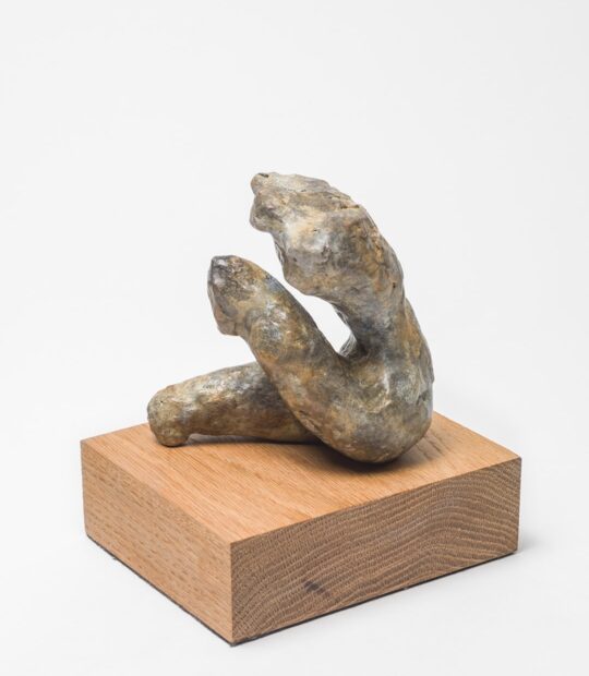 Figurative sculpture Held with Light Patina