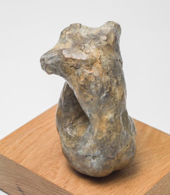 Figurative sculpture Held with Light Patina